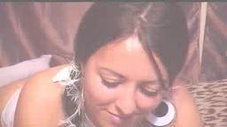 Pig-tailed Brunette Fingers Her Bum
