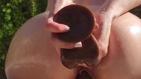 Solo girl oiled up for BBC dildo double penetration
