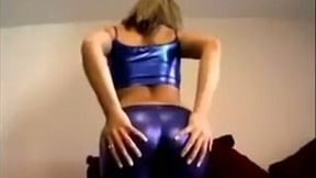 This blonde looks great in blue spandex and she definitely loves to squat