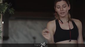 A transgender woman enjoys having her personal trainer pleasure her