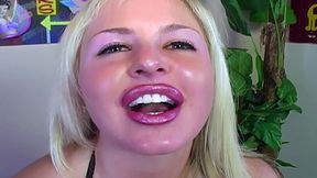 Blonde babe Andi Anderson crams POV tool down her throat, deepthroats, sucks hard