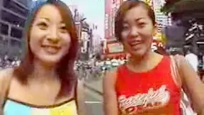 Sexy japanese babes are sucking huge cock in the public