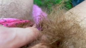 Very Hairy Mature Woman Displays Her Vulva at the Beach