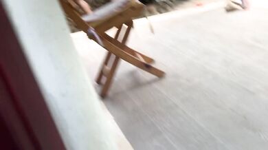 My neighbors are taking a shower on the patio. I must go there to see it up close