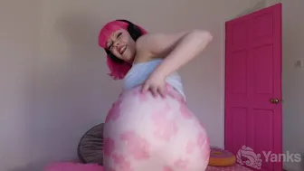 Evie Rees dances with pink hair and big ass in sheer tank top