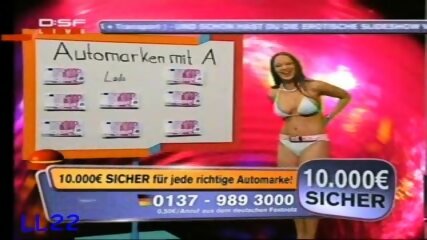 German host of TV game show strips off her top