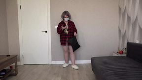 Busty MILF nurse tries on a sexy uniform