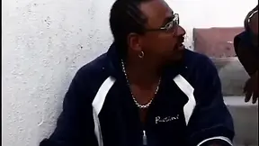 Blonde floozy gets shared by a group of black dudes in a wild spit roast
