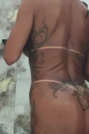 Seductive and Oiled Military Woman