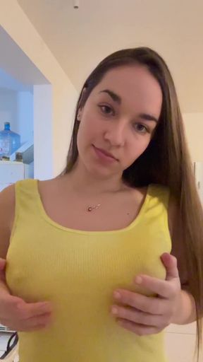 Big-titted cutie shows off her assets