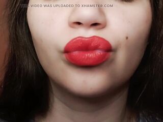 Big red lips smokin' close up