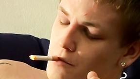 ”Tomy cant help rubbing his throbbing prick while smoking”