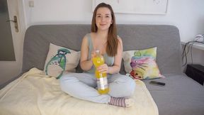 Drinking A Large Bottle of Soda and Trying To Burp