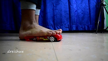 Destroying big car with toy airplane