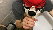 Young guy sucks deepthroat big cock in public toilet