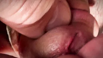 Guy pisses on his own balls and hard cock in close-up