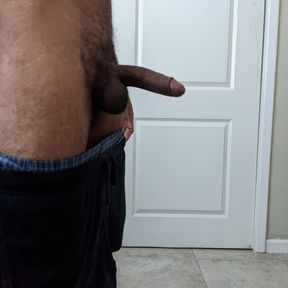 Spreading ass and jacking uncircumcised dick