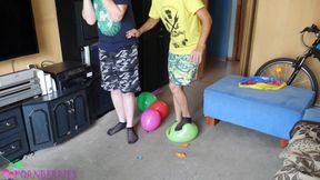 Thin, black socks blowing up balloons + footjob