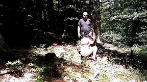 Kinky couple caught playing in the woods