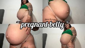 Pregnant belly + protruding navel