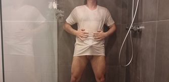 Striptease in the shower with wet white briefs and shirt
