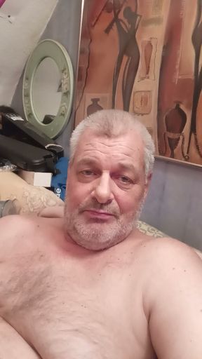 Masturbating man with a vibrator while hearing a lovely voice of a horney  woman.