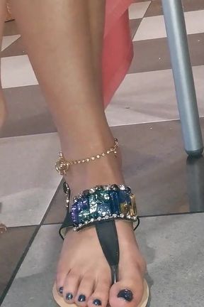 Dangling and Shoeplaying in a Bar with My Blue Estrada' Flip Flops