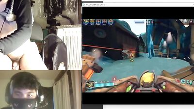 Masked chap is playing with his prick while streaming a video game