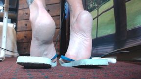 Filthy blue flip flops worn out