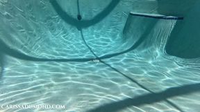 Carissa swimming in the pool in a red open-crotch and open bra lingerie piece