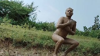 Desi bottom in leather latex costume crosses muddy jangal in gay boy porn