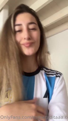 Woman in Argentina soccer jersey