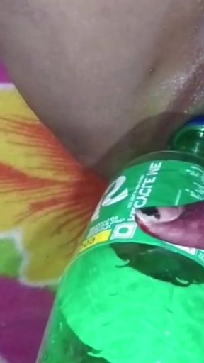 My stepsister put a bottle of Sprite in her pussy and drained her pussy?   Clip 1