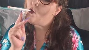 Hot smoking mommy with stiletto heels and big tits