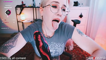 Tomboy sucking on dildo