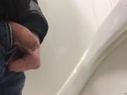 A quick pee in the urinal