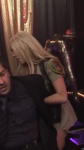 Stunning moment from "Blonde milf Stacey Saran is dressed up as a police officer in sexy fishnets and then fucked hard"