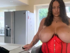 Brunette with big boobs masturbates