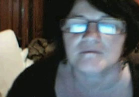 Ugly and fat webcam granny in glasses plays with her dirty cunt