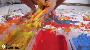 Topless Belle Plays Around with Paint Using Her Perfect Feet and Hands