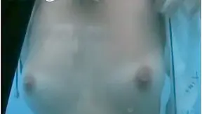 Sporty Beauty’s Wet Shower Moment – Firm Tits Splashing Under Water