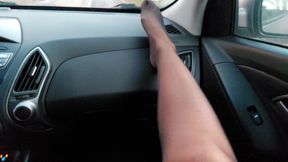 Hot mature stepmom in stockings gives her stepson a footjob in the car, while he drives