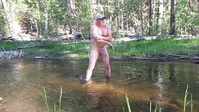 Naked bathing in the river.