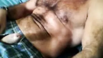 Bearded daddy bear strokes his big hairy cock solo