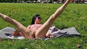 Brunette milf flashing pussy and pissing in a public park