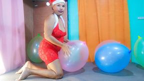 Santa's Sexy Helper Juju Sits To Pop Your Big Punch Balloons