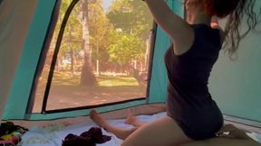Redhead Latina in bikini gets fucked in a tent at camping