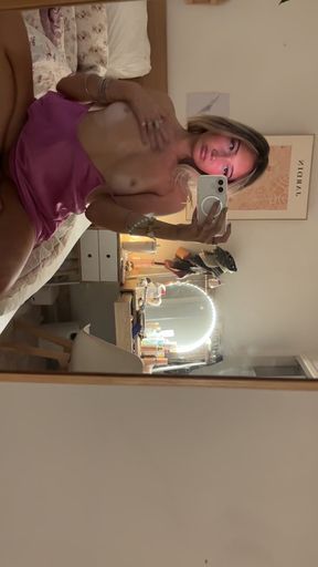 Blonde Latina poses while fingering her tight ass