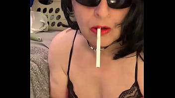 Cd Nikki smokes and plays with fake cum