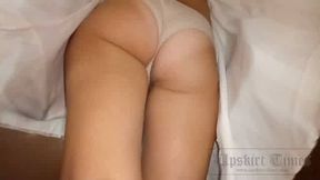 tanned russian gets skirt lifted on escalator